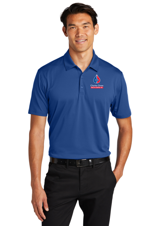 K398 Port Authority® Performance Staff Polo in royal with CDHC logo on left chest.