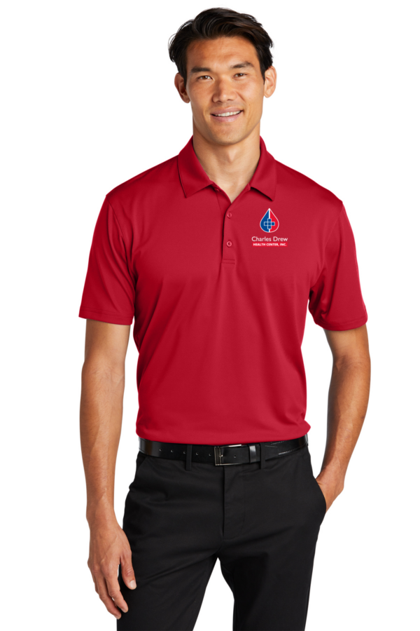 K398 Port Authority® Performance Staff Polo in red with CDHC logo on left chest.