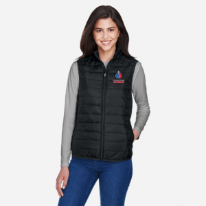 A woman wearing the packable puffer vest in black, with the CDHC logo on the left chest