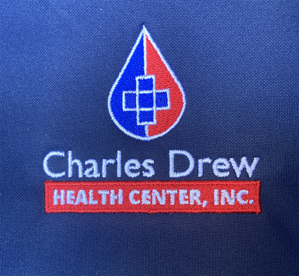 embroidered sew out of the Charles Drew Health Center logo
